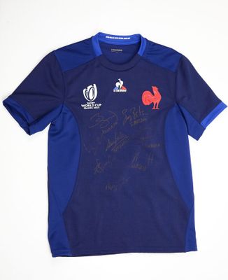 a close up of a shirt with a rooster on it