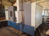 une photo d'une grosse machine dans un atelier