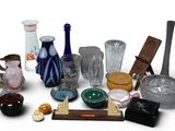 a lot of glass items that are sitting on the table