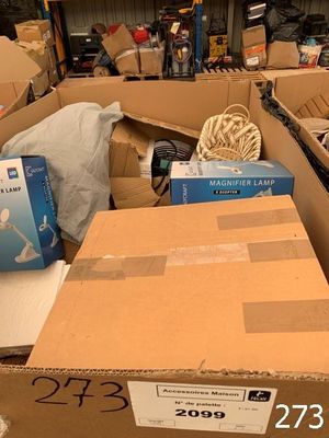 many boxes that are stacked up in a warehouse