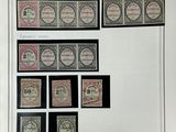 une image représentant une photo d'une collection de timbres sur une feuille de papier
