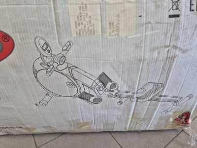 a cardboard box with a drawing of a robot on it