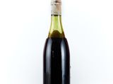 a bottle of wine that is sitting on a table
