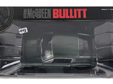 packaging of a black and white model of a car in a box