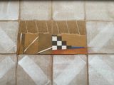 a picture of a piece of cardboard on the floor
