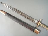 two different types of knives on a table