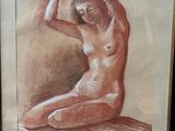 tableau représentant une femme nue assise sur un tapis, dans un cadre