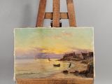 une peinture à l'huile représentant un bateau sur une plage, à côté d'un chevalet en bois