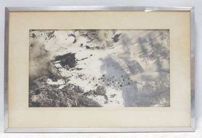 a picture of a black and white picture of a mountain range