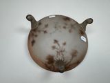 a picture of a glass vase with a flower design on it