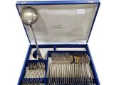 a blue case with silverware in it on a white background