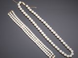 a cultured pearl and diamond necklace and bracelet suite