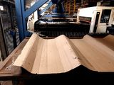 a picture of a machine that is working on a piece of wood