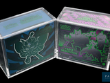 two cds in a clear box on a black background