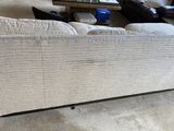 a couch that is sitting in the middle of a living room