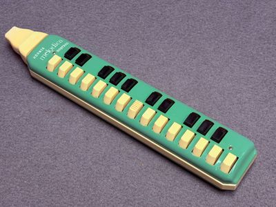 Melodica Honher vert en étui. L.