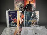 the contents of a collection of fantasy books are displayed on a table