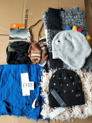 many items that are in a box on the floor