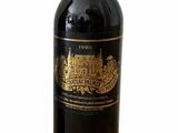 a bottle of wine that is sitting on a table