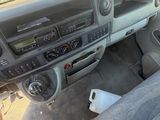 a dashboard of a truck with a steering wheel