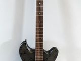 an image of a black electric guitar on a white background