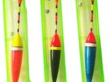 four different colored fishing lures in a plastic case