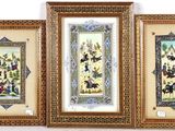 three framed paintings of people and animals on a wall