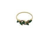 a close up of a gold ring with green and white stones