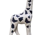 statue of a giraffe on a black base on a white background