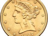 gros plan d'une pièce de monnaie sur laquelle figure une tête de femme