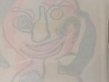 a drawing of a cartoon character on a piece of paper