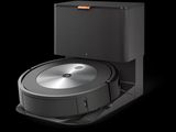 an image of a robotic vacuum cleaner on a black surface