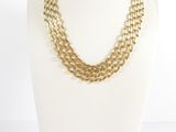 a gold chain necklace on a mannequin mannequin mannequin mannequin mannequin mannequin mannequin mannequin manne