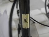 a close up of a bicycle with a number on it