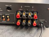 a close up view of a stereo system on a table