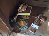 a cross, a book, and a crucifix on a table