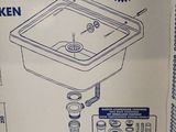 packaging of a boxed sink with instructions and instructions on it