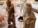 many figurines that are sitting on a table