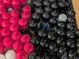 a table with a lot of bottles of different colors on it