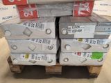 several boxes of printer cartridges stacked on top of a pallet