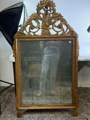 a mirror that is sitting on a table