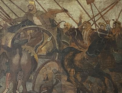 une peinture sur le mur d'un immeuble représentant des personnes à cheval