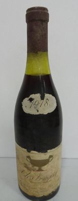 a bottle of wine that is sitting on a table