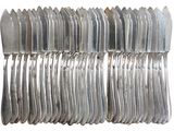 a lot of forks and spoons stacked on top of each other