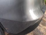 a close up of a car ' s front bumper