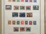 an open book with a bunch of stamps on it
