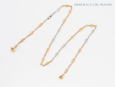three different types of gold and silver chain necklaces on a white background
