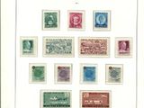 une photo encadrée représentant une collection de timbres allemands