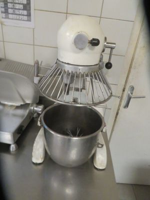 an image of a kitchen with a mixer and a bowl