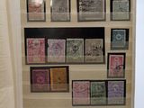 an open book with a bunch of stamps on it